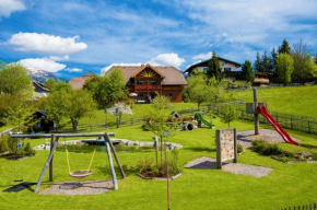 Отель Familien-Appartements Örglwirt's Gut, Мариапфар